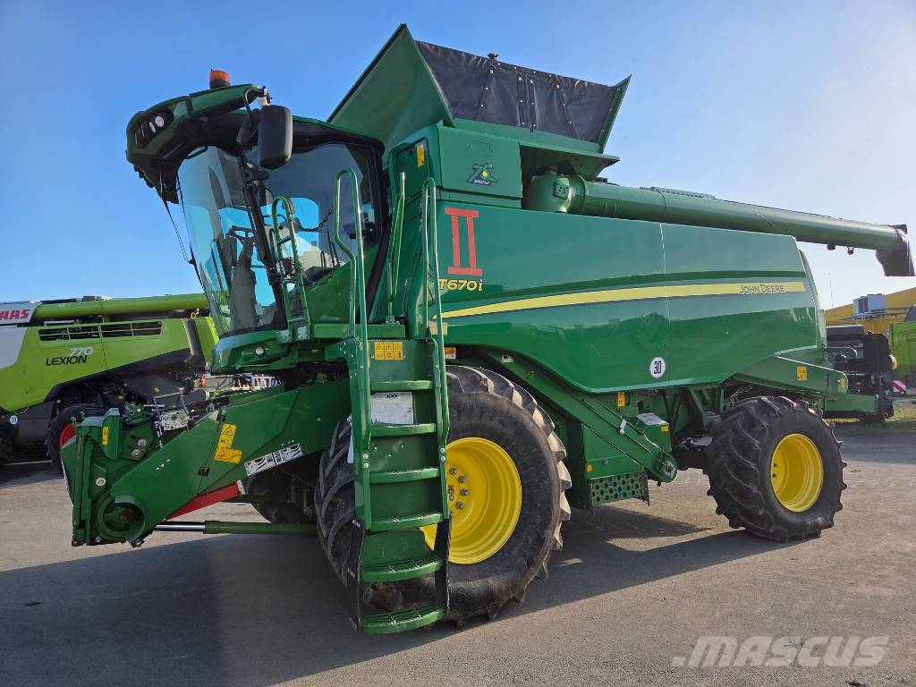 John Deere T 670 i Kombajni