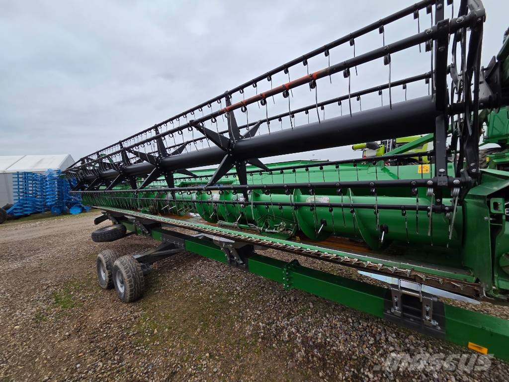 John Deere T 670 i Kombajni