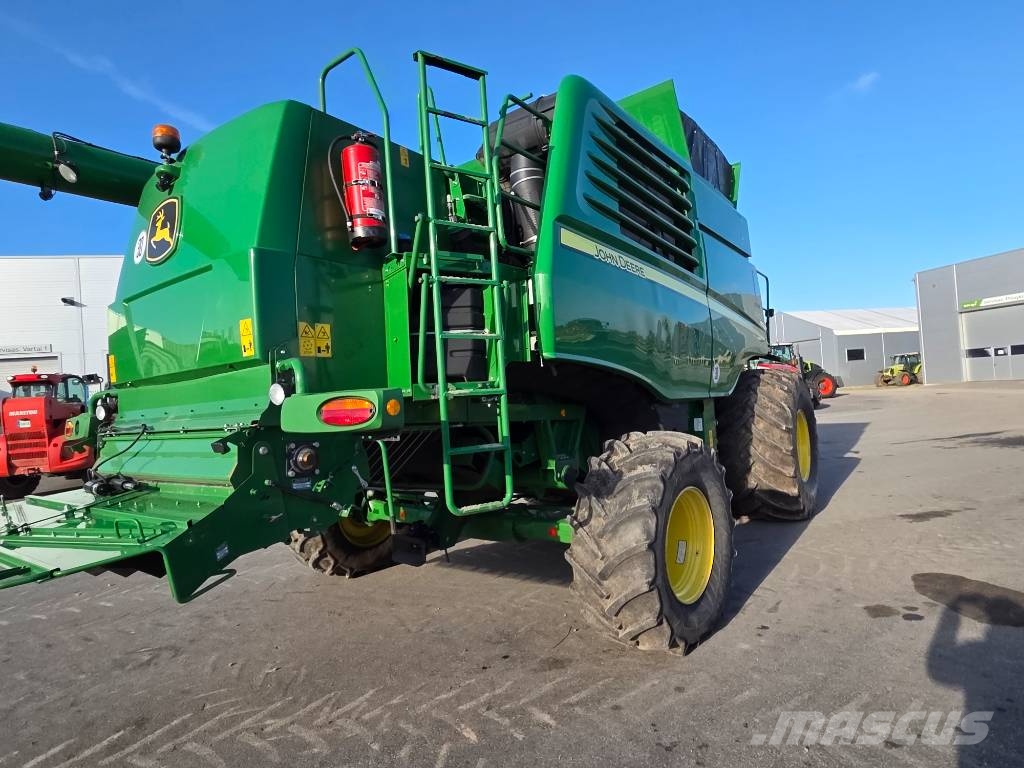John Deere T 670 i Kombajni