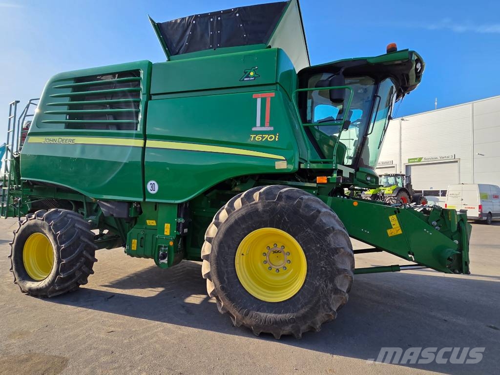 John Deere T 670 i Kombajni