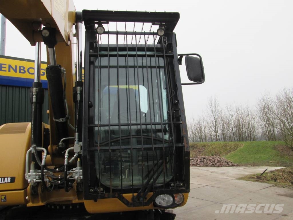 CAT M 313 D cabine bescherming Kabinen
