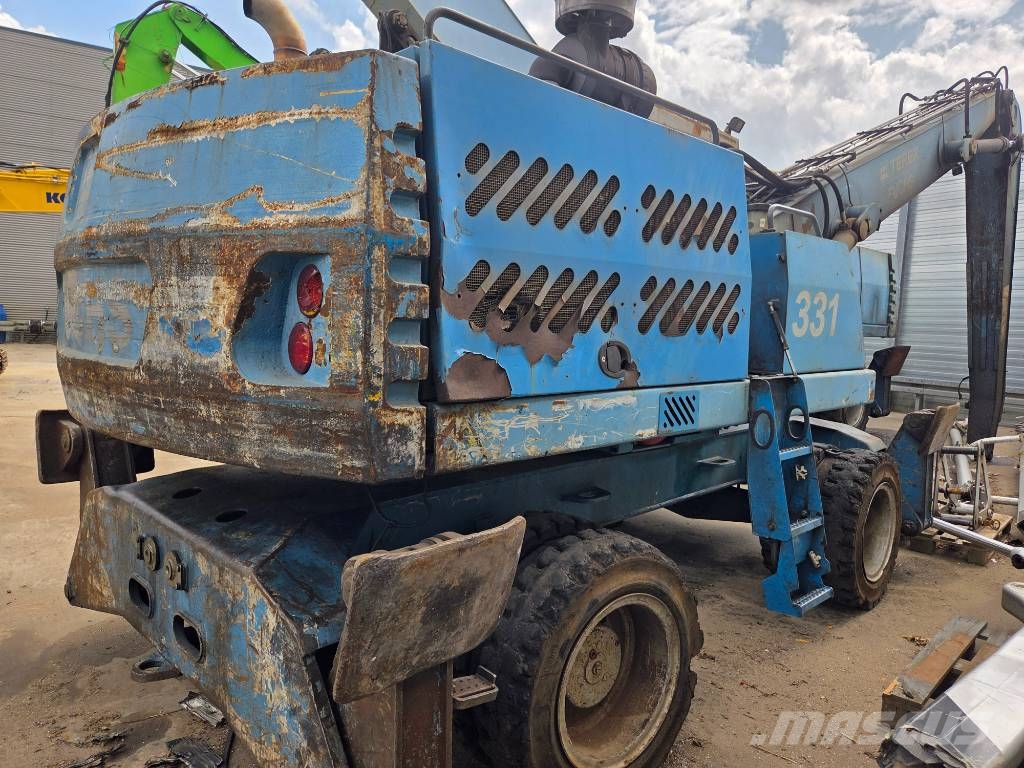 Fuchs MHL 331 D مناولات المخلفات / مناولات صناعية