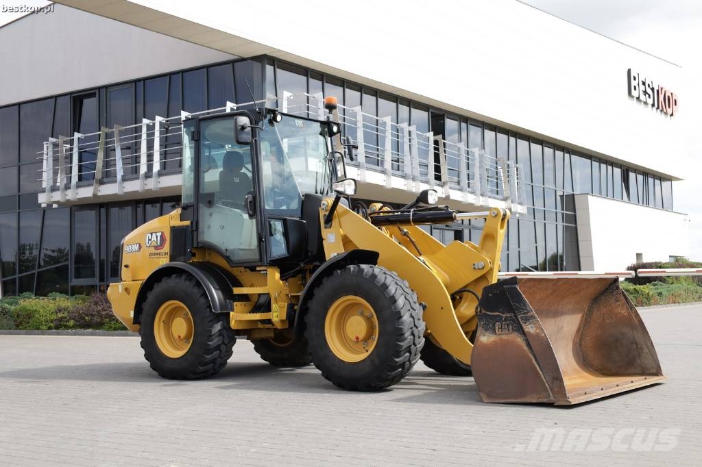 CAT 908M لوادر بعجل