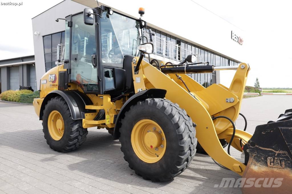 CAT 908M لوادر بعجل