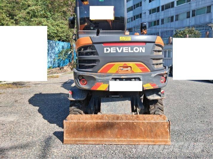 Doosan DX 55 W حفارات بعجل