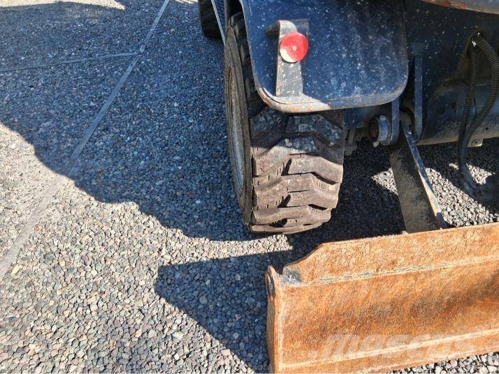 Doosan DX 55 W حفارات بعجل