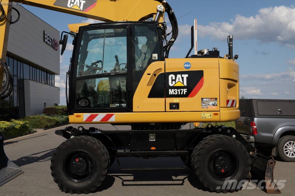 CAT M317F Wielgraafmachines