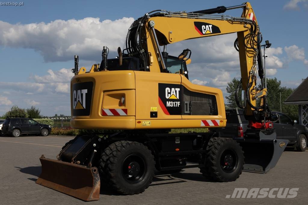 CAT M317F Wielgraafmachines