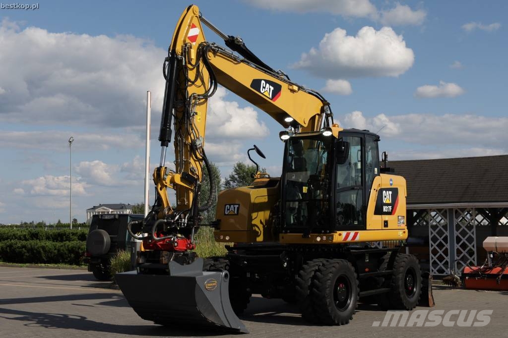 CAT M317F Wielgraafmachines