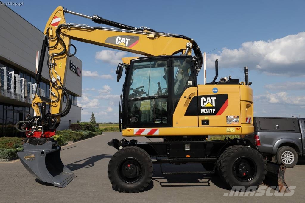 CAT M317F Wielgraafmachines