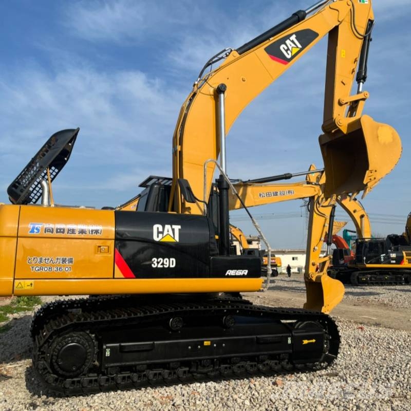 CAT 329 Гусеничні екскаватори