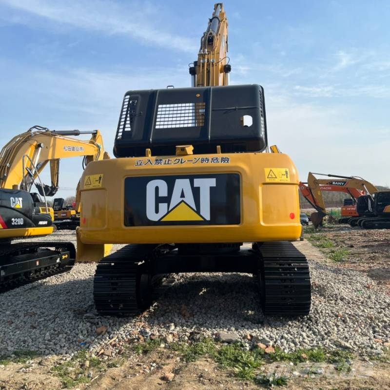CAT 329 Гусеничні екскаватори