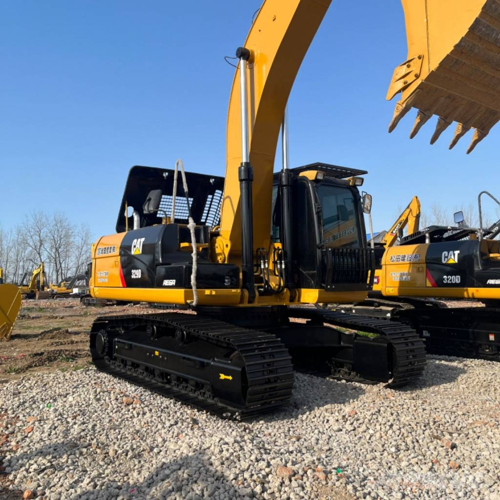 CAT 329 Гусеничні екскаватори