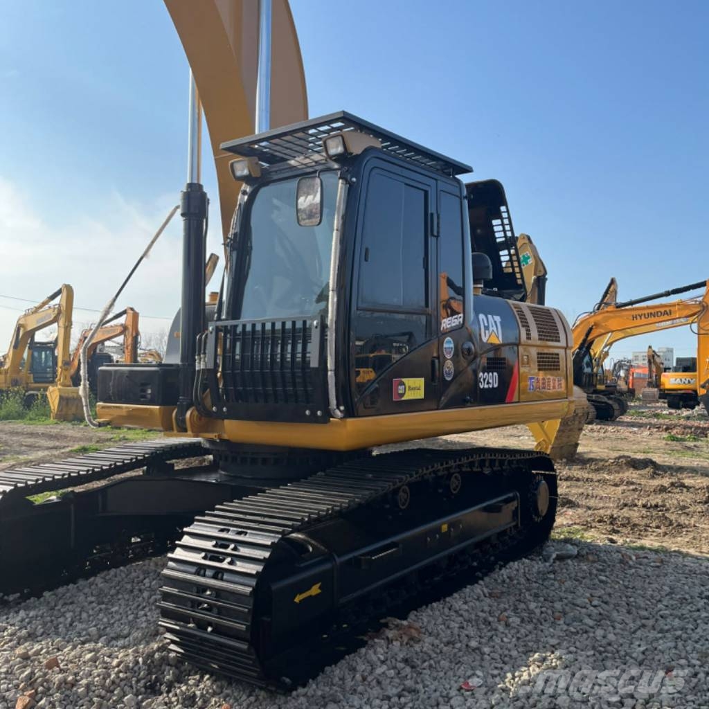 CAT 329 Гусеничні екскаватори