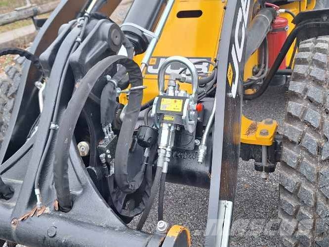 JCB 409 + työlaitteet Radlader