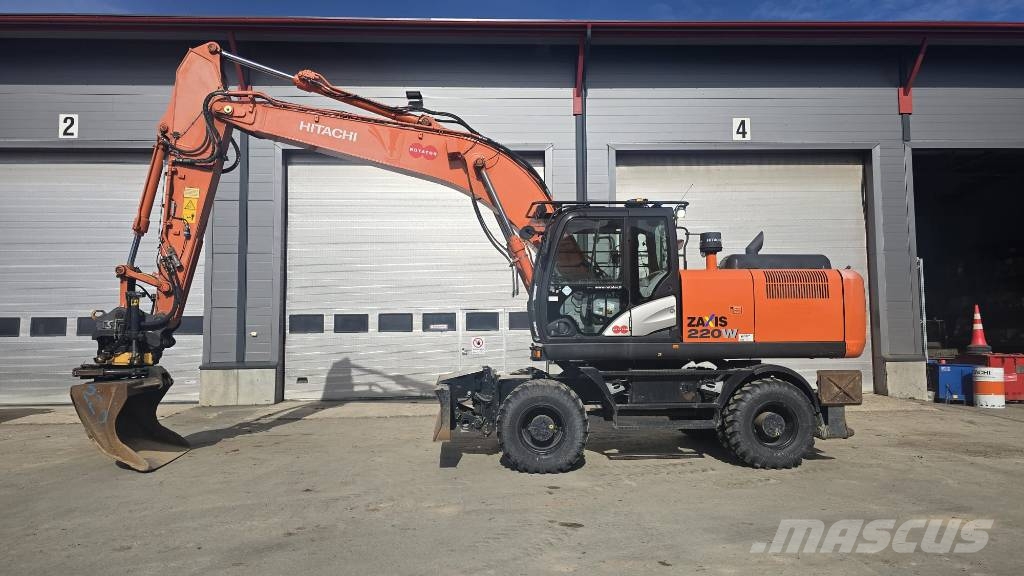 Hitachi zx220 W -5 حفارات بعجل