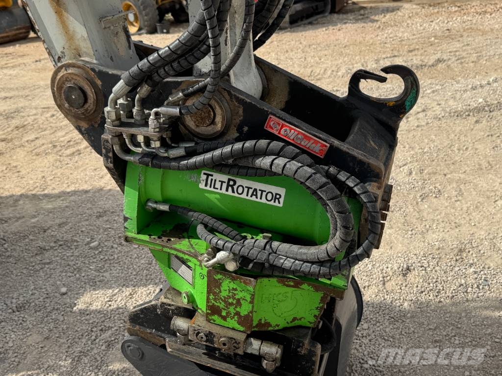 Takeuchi TB 295 W حفارات بعجل