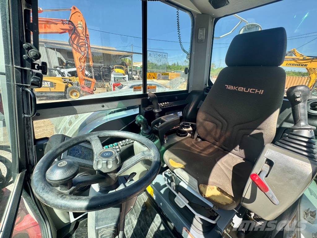 Takeuchi TB 295 W حفارات بعجل