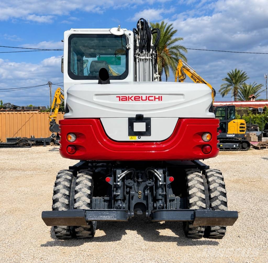 Takeuchi TB 295 W حفارات بعجل