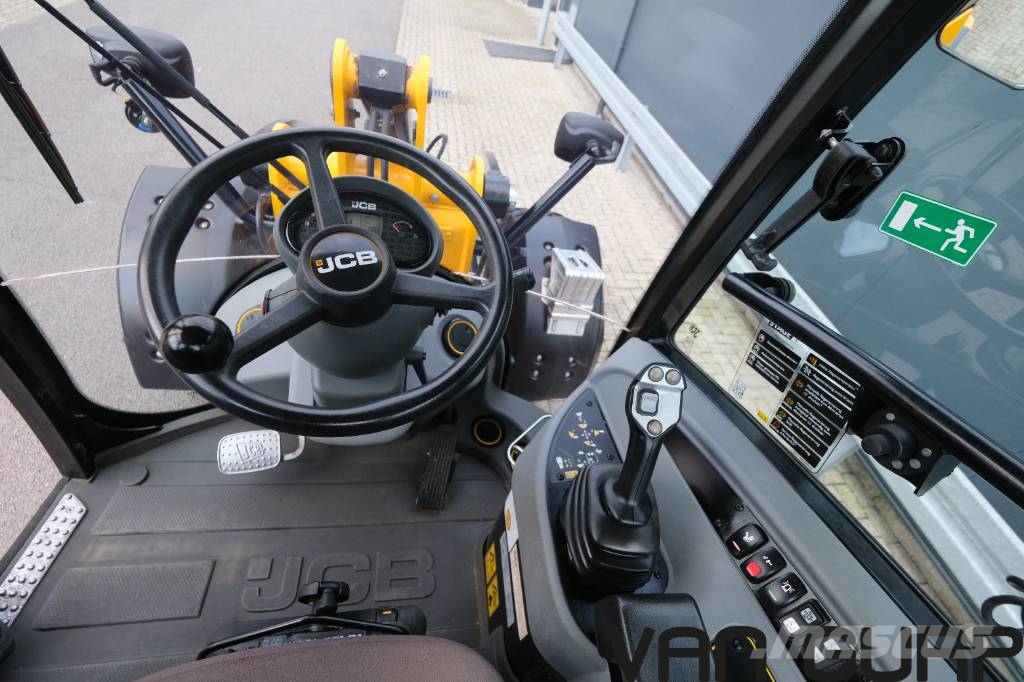 JCB 409 Iekrāvēji uz riteņiem