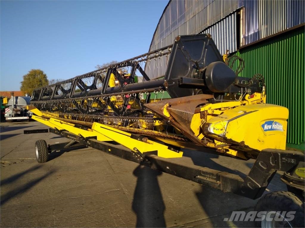 New Holland 30 V mit Wagen 하비스터 헤드