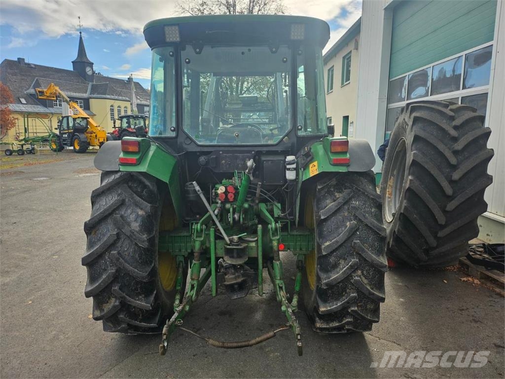 John Deere 5215 mit FL Tractoren