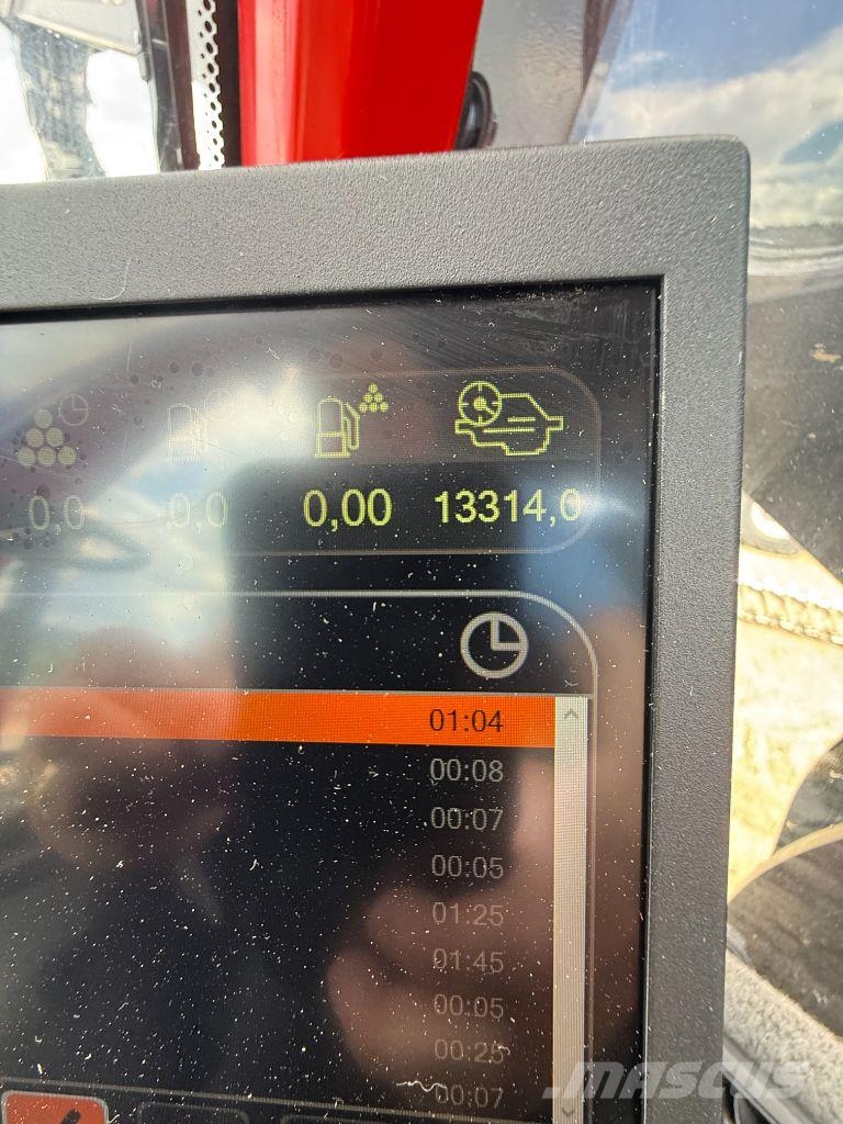 Komatsu 951 Харвестери