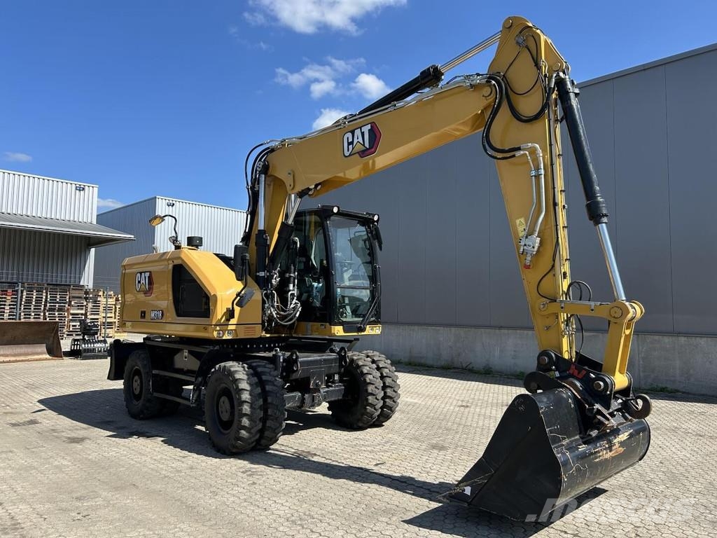 CAT M318-07 Wielgraafmachines