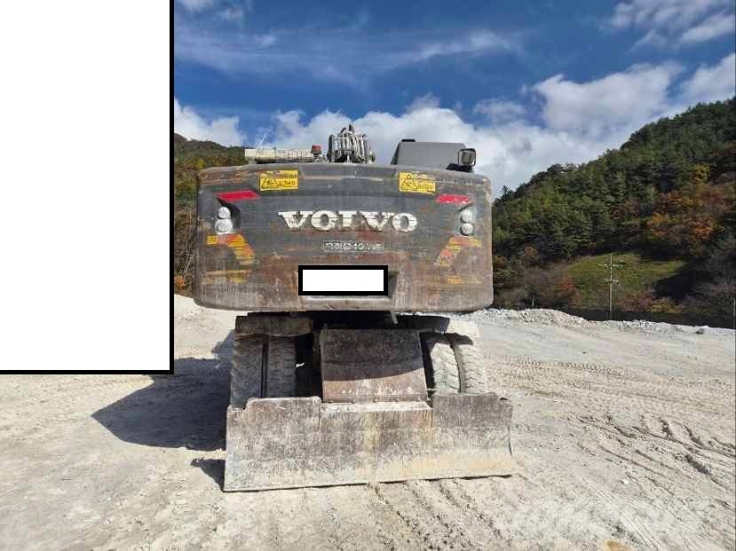 Volvo EW 205 D حفارات بعجل