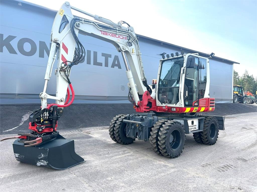 Takeuchi TB295W PYÖRITTÄJÄLLÄ Excavadoras de ruedas