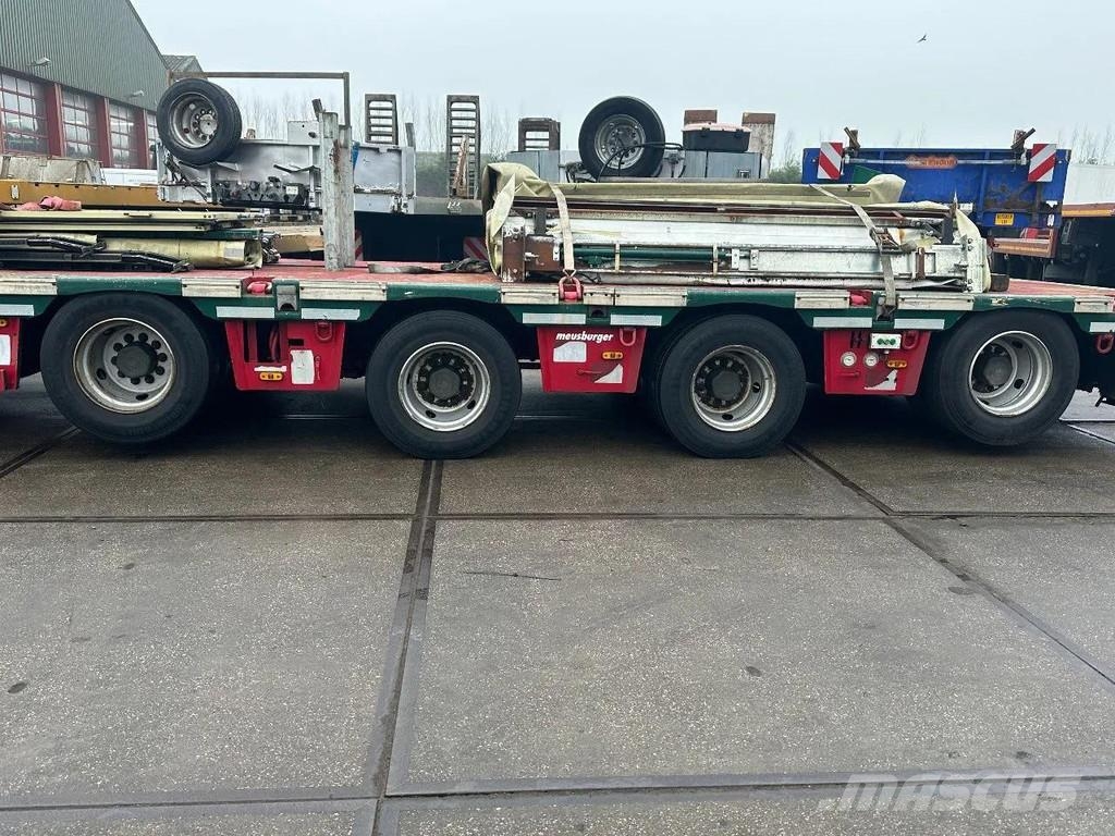 Meusburger 4 AXLE STEERING - DOUBLE EXTENDABLE UP TO 28 M - E نصف مقطورة مسطحة منخفضة