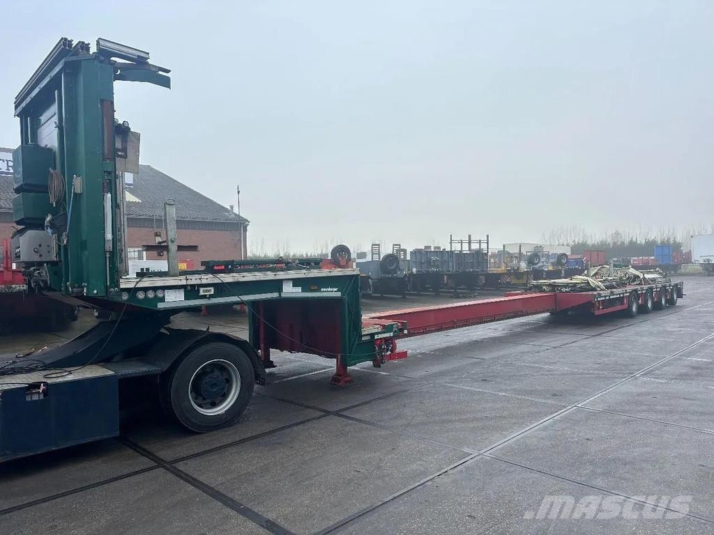 Meusburger 4 AXLE STEERING - DOUBLE EXTENDABLE UP TO 28 M - E نصف مقطورة مسطحة منخفضة
