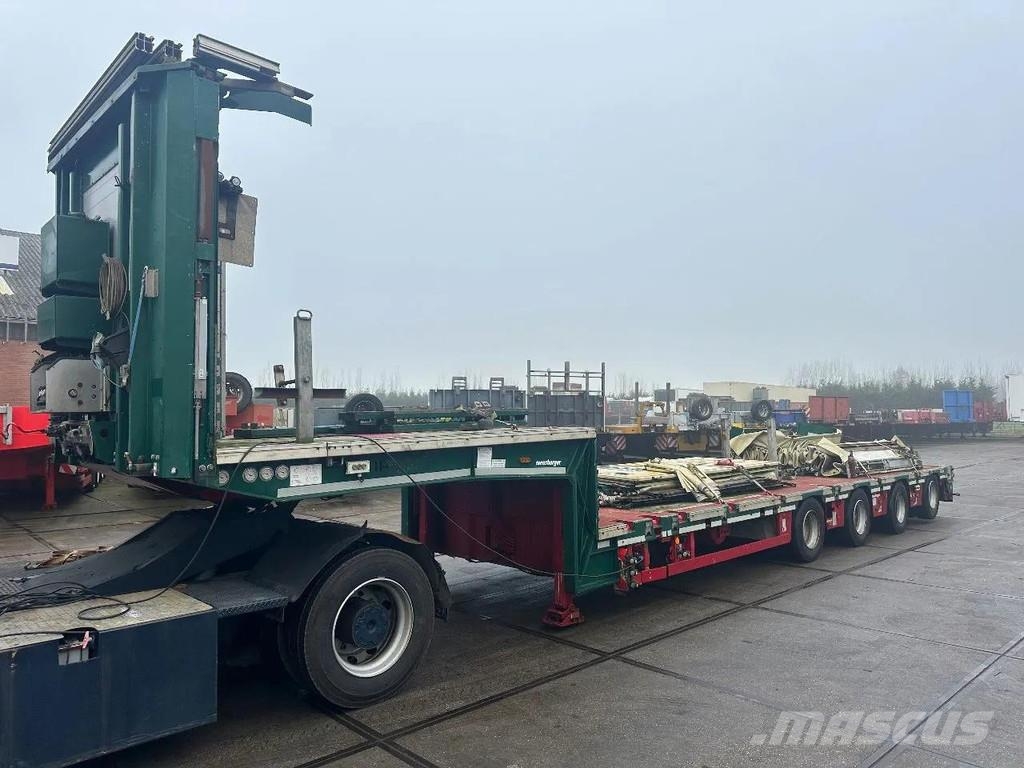Meusburger 4 AXLE STEERING - DOUBLE EXTENDABLE UP TO 28 M - E نصف مقطورة مسطحة منخفضة