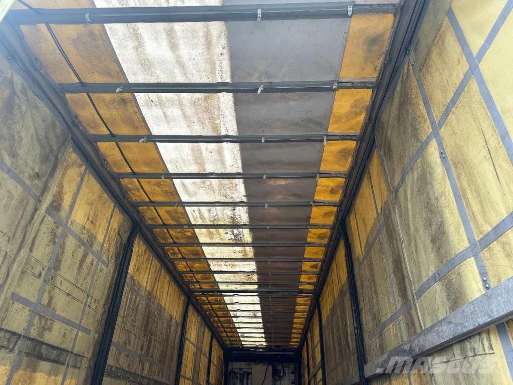 Meusburger 4 AXLE STEERING - DOUBLE EXTENDABLE UP TO 28 M - E نصف مقطورة مسطحة منخفضة