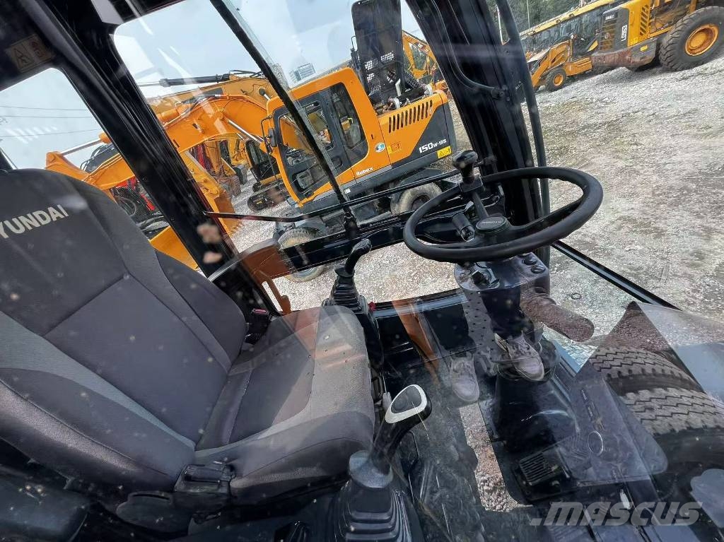 Hyundai 210W-9S Gravemaskiner på hjul