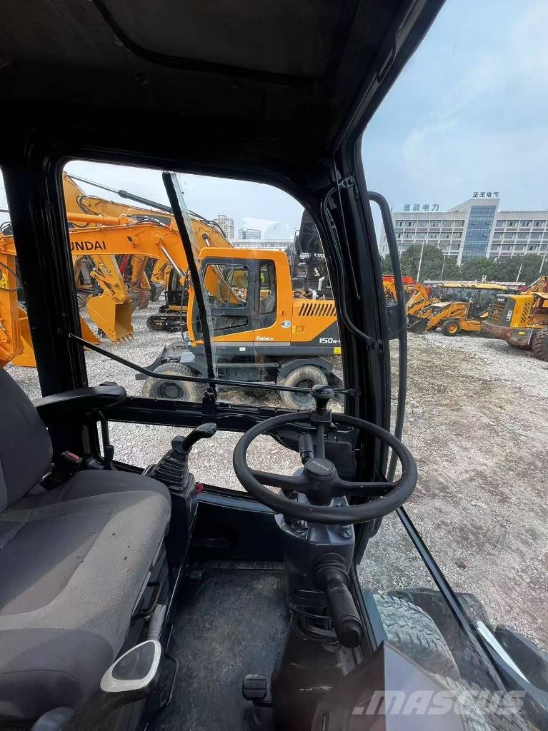 Hyundai 210W-9S Gravemaskiner på hjul