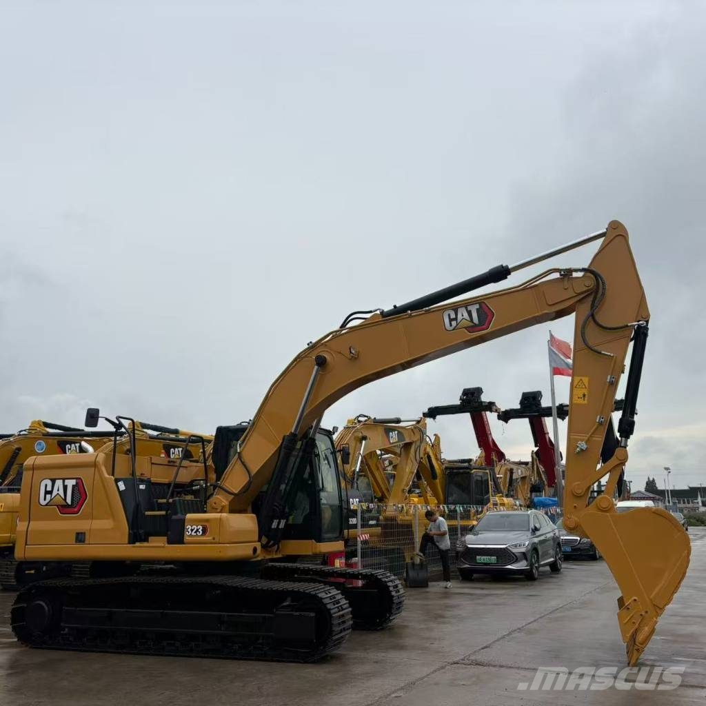 CAT 323 Bagri goseničarji