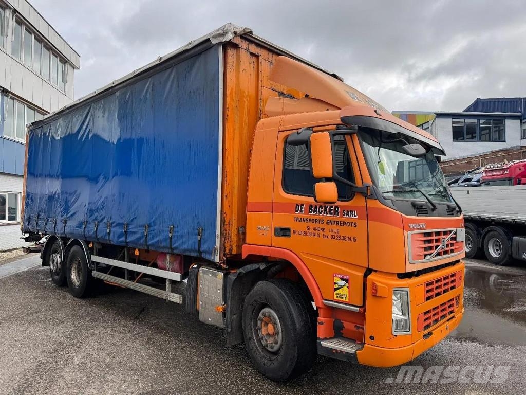 Volvo FM 340 6X2 DHOLLANDIA 2000 KG CURTAINS Camión con caja abierta