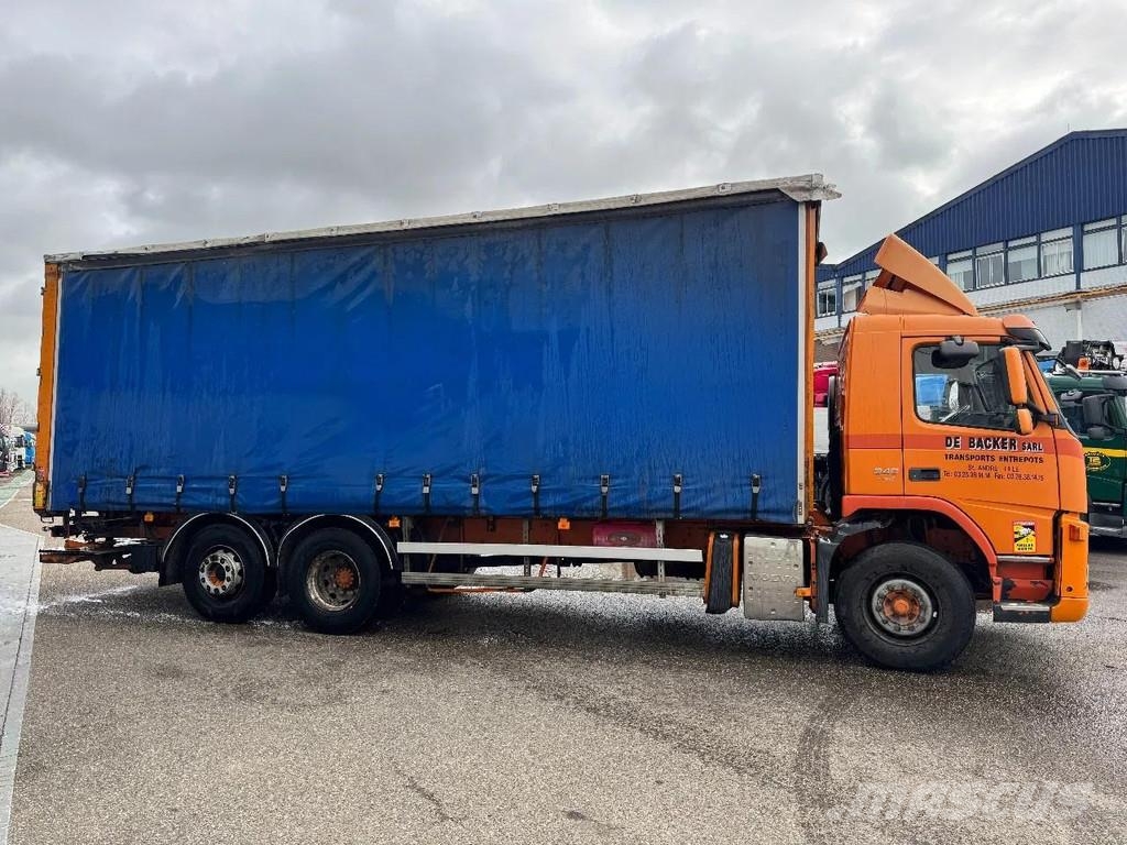 Volvo FM 340 6X2 DHOLLANDIA 2000 KG CURTAINS Camión con caja abierta