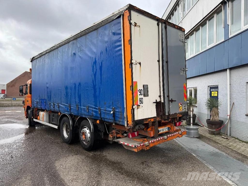Volvo FM 340 6X2 DHOLLANDIA 2000 KG CURTAINS Camión con caja abierta