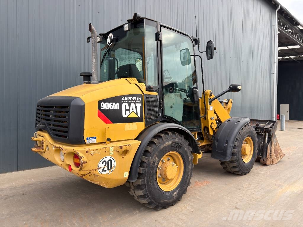 CAT 906M Iekrāvēji uz riteņiem