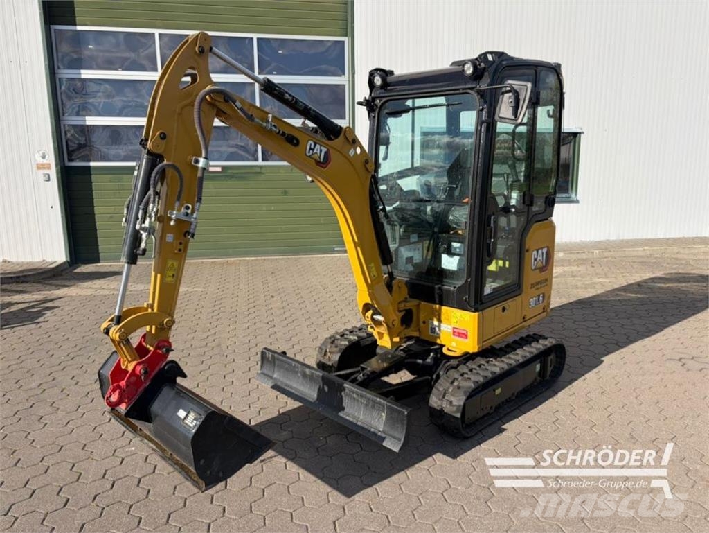 CAT 301.6 Ekskavatori uz riteņiem