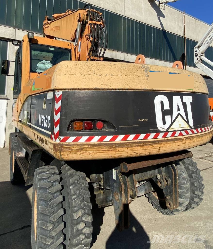 CAT M 318 C Mobilbagger