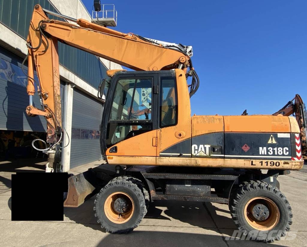 CAT M 318 C Mobilbagger