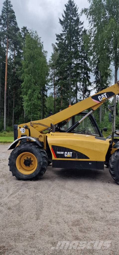 CAT TH 330 B Lauksaimniecības pacēlāji