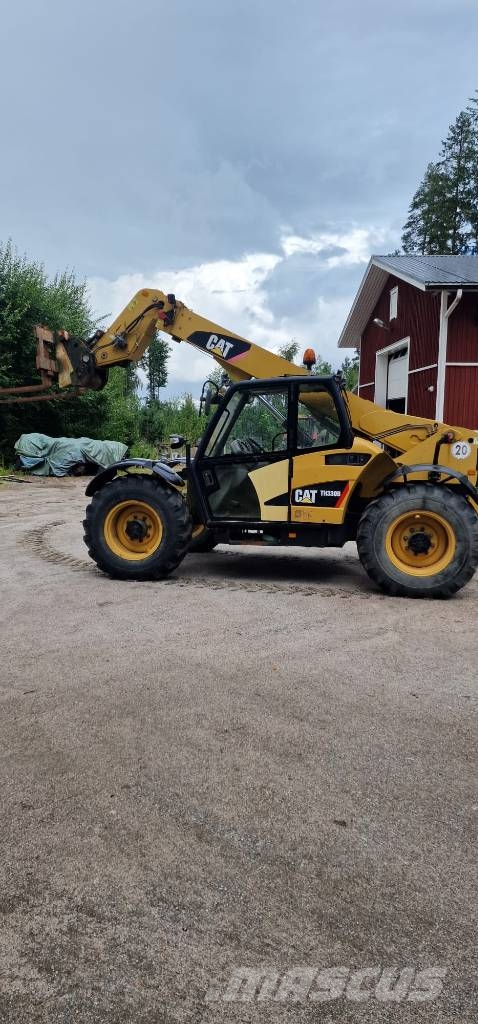 CAT TH 330 B Lauksaimniecības pacēlāji