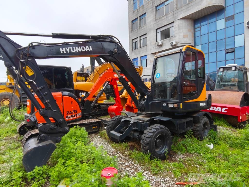 Hyundai 60 W VS Ratiniai ekskavatoriai