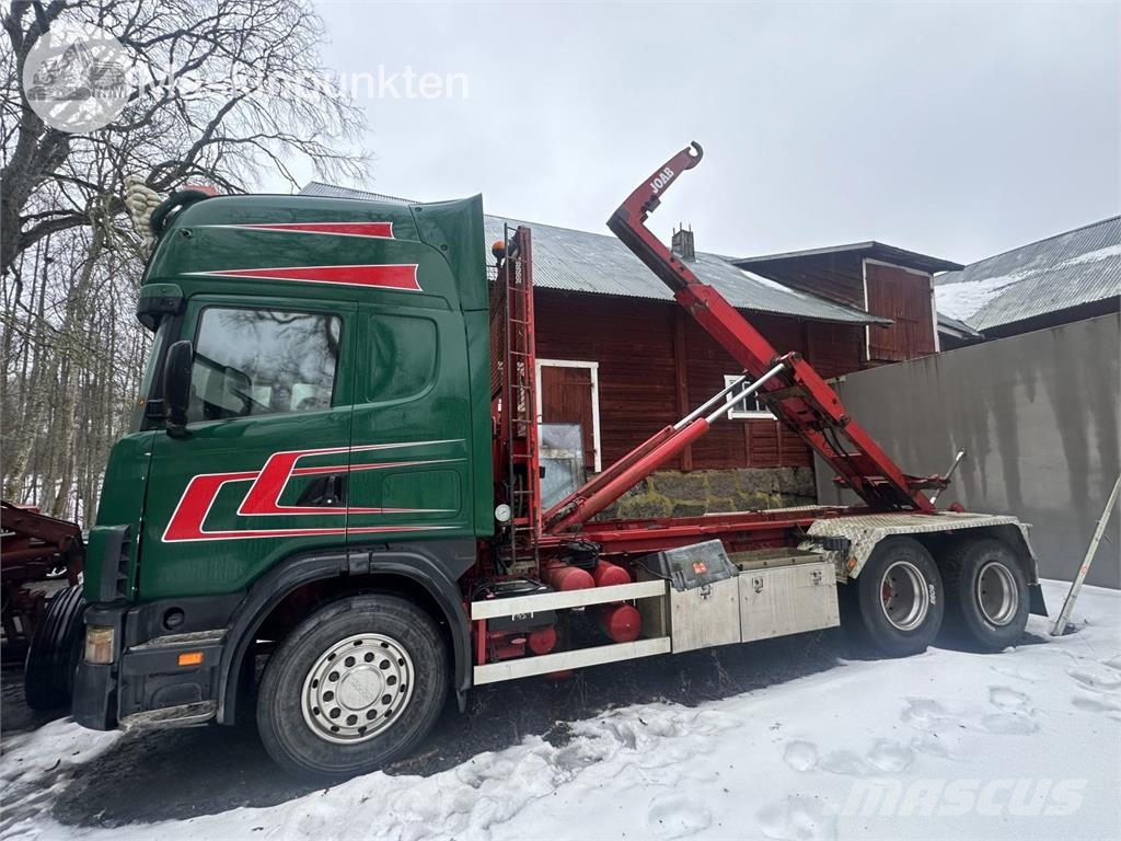 Scania R124GB6X2NZ470 훅 리프트 트럭