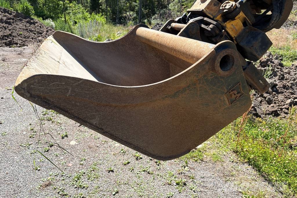 Huddig 1060C, Bra skick, Nya Däck Utovarni rovokopači