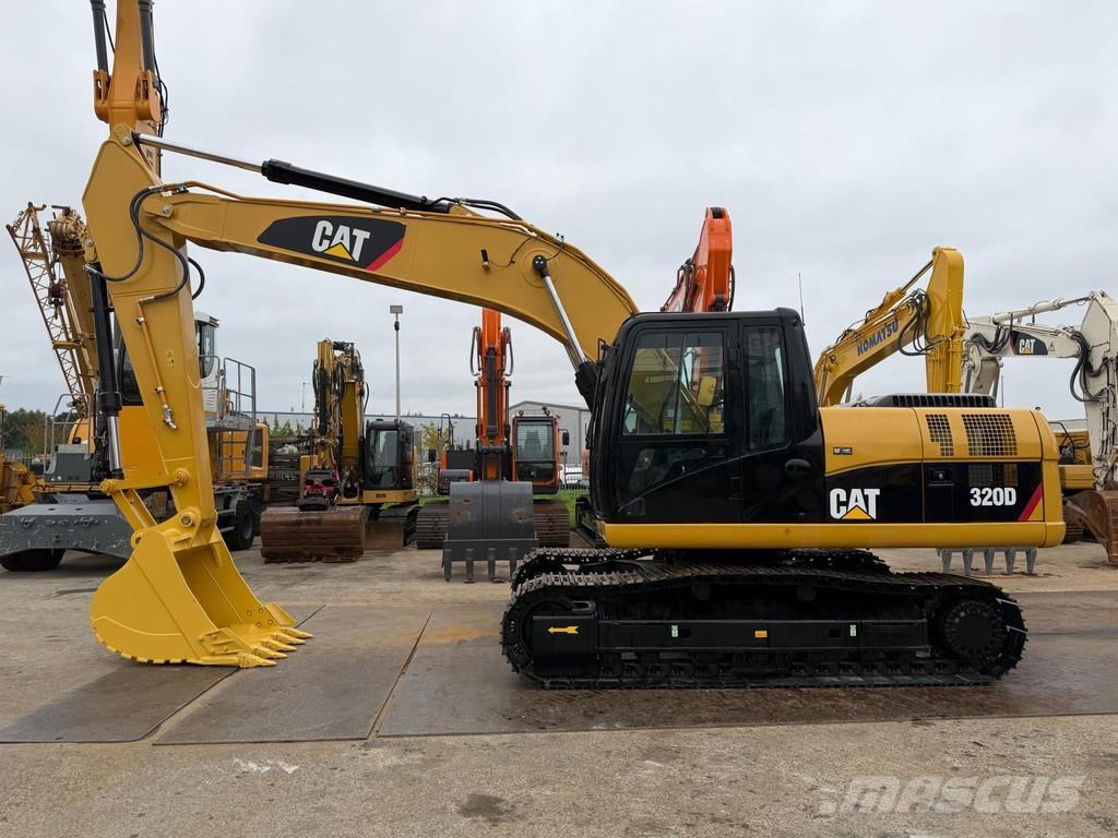CAT 320 DL . Raupenbagger